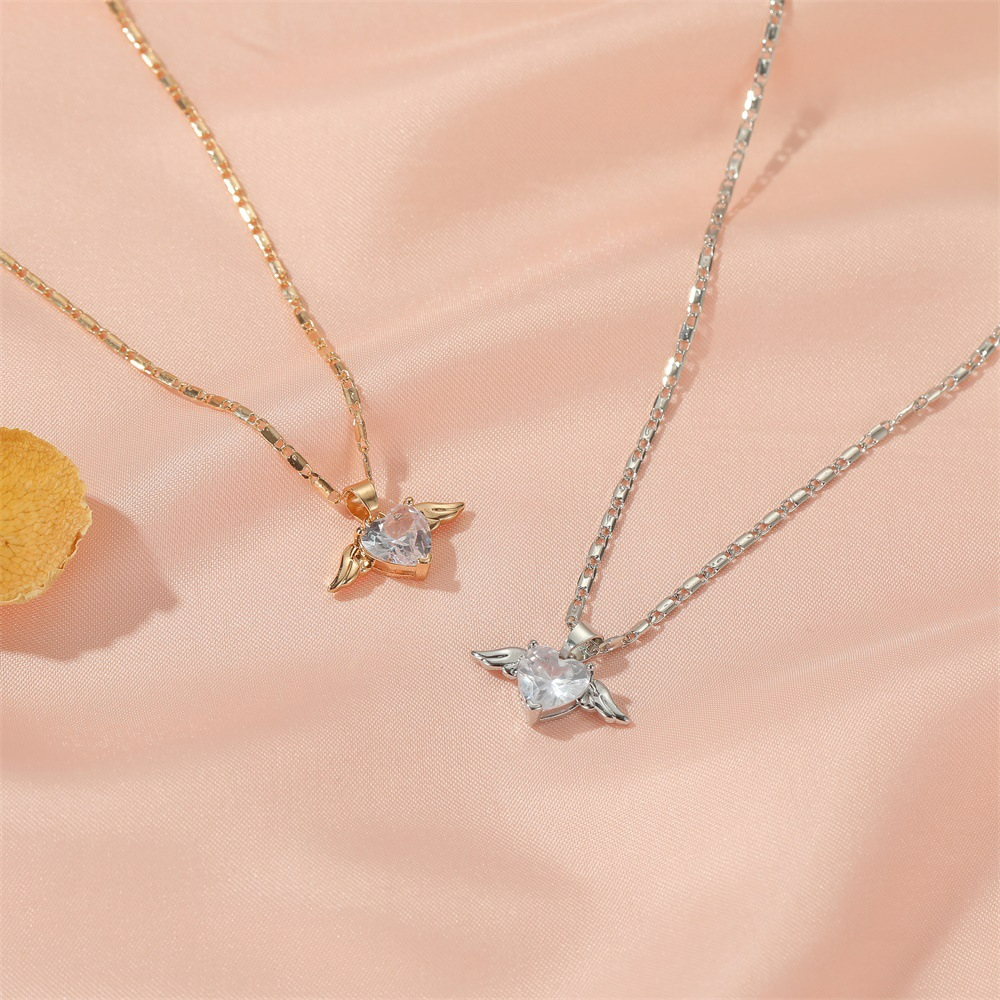 Halskette Flügel der Liebe - Kette mit Herz und Flügeln