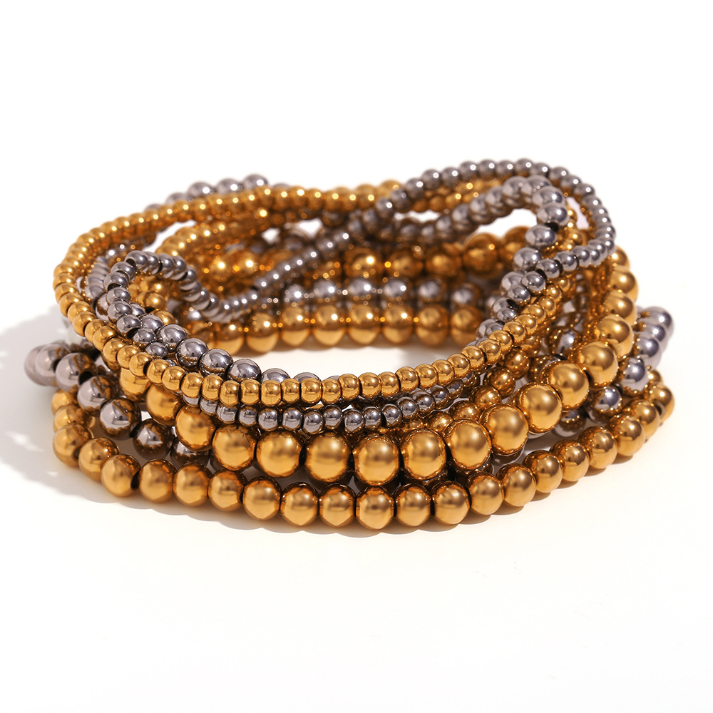 Crea - Stilvolles stapelbares goldenes Metallarmband (4mm)