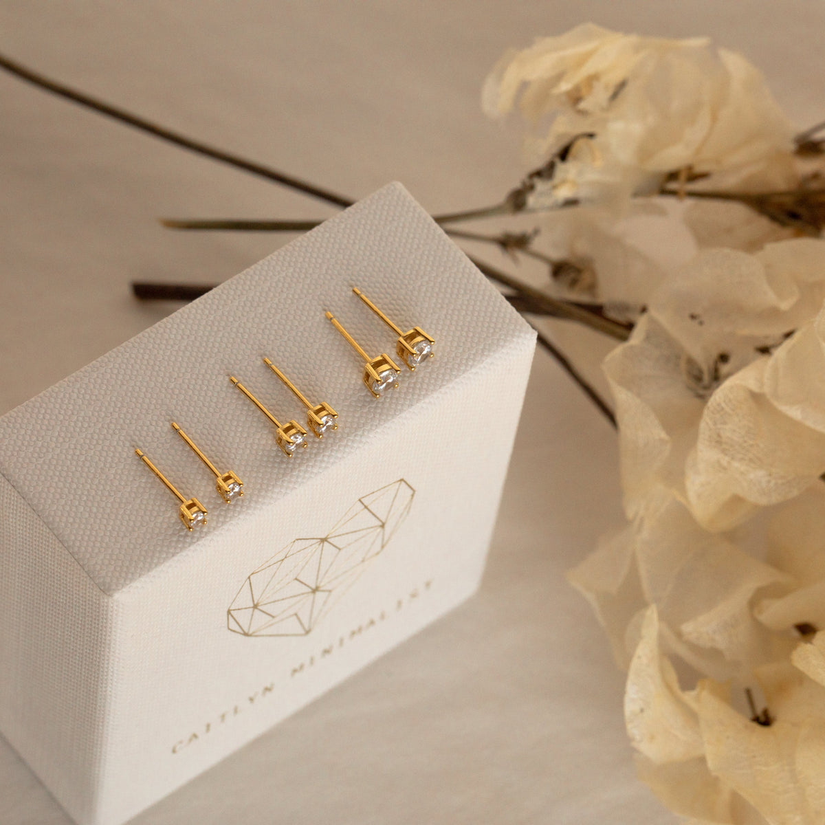 Booker – Elegantes Ohrring-Set mit Glanzdetails