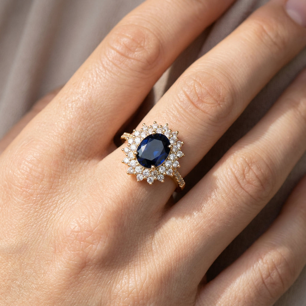 Delphine – Stilvoller goldener Ring mit blauem Stein