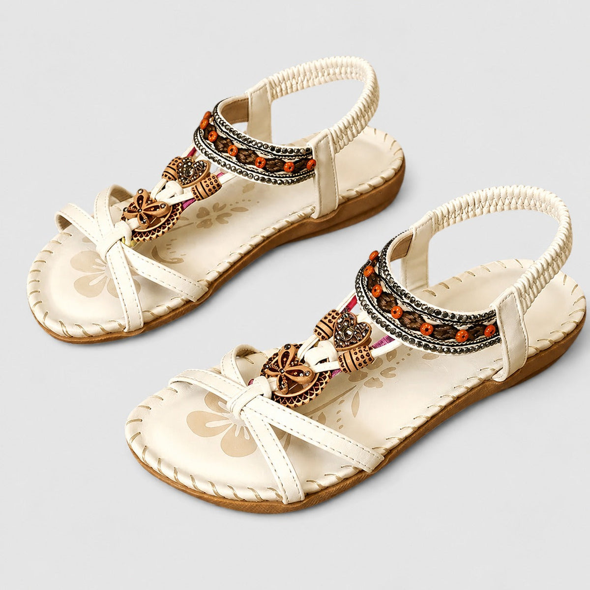 Eleanor - Stilvolle flache Sandalen mit glanzvollen Details