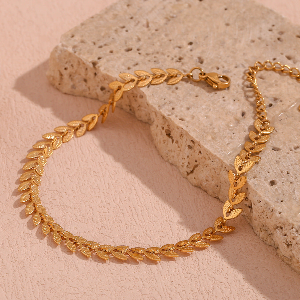 Delaida - Armband mit goldenem Blattdesign