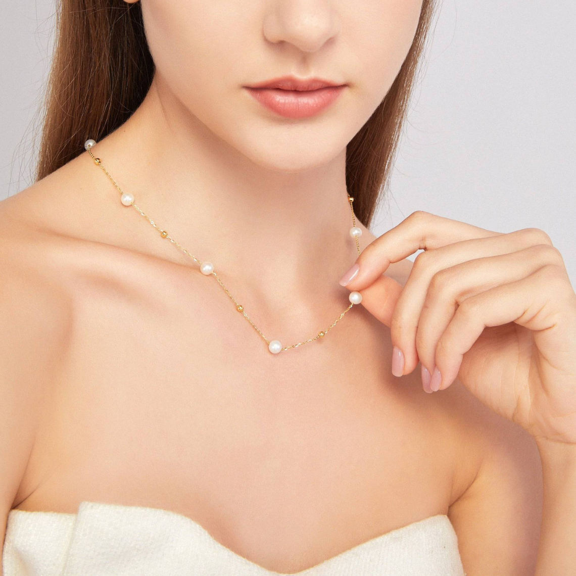 Kette aus Gold und Perlen - abwechselnd Perlen und Goldglieder
