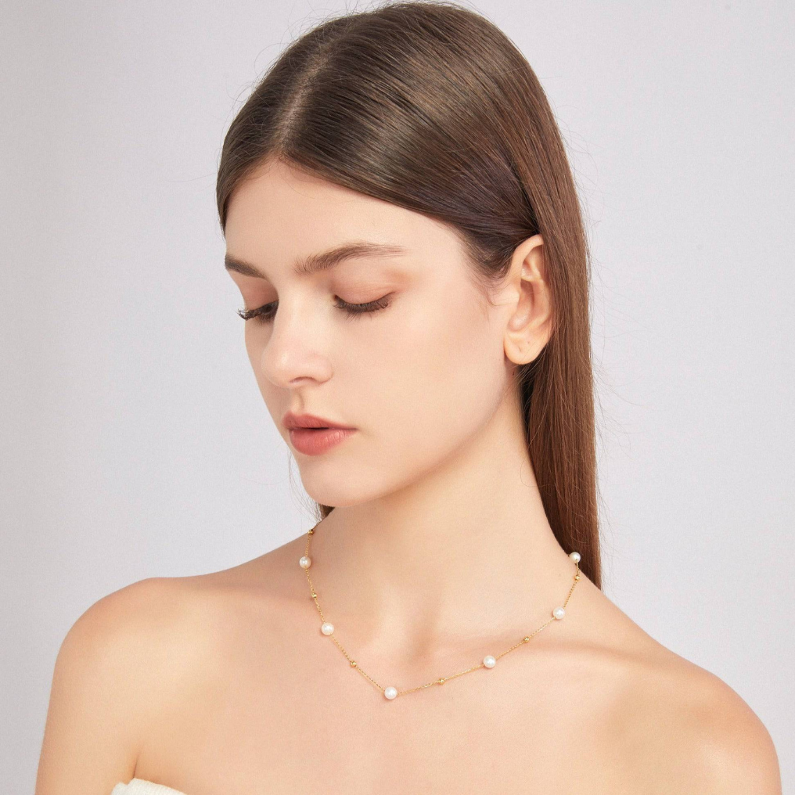 Kette aus Gold und Perlen - abwechselnd Perlen und Goldglieder