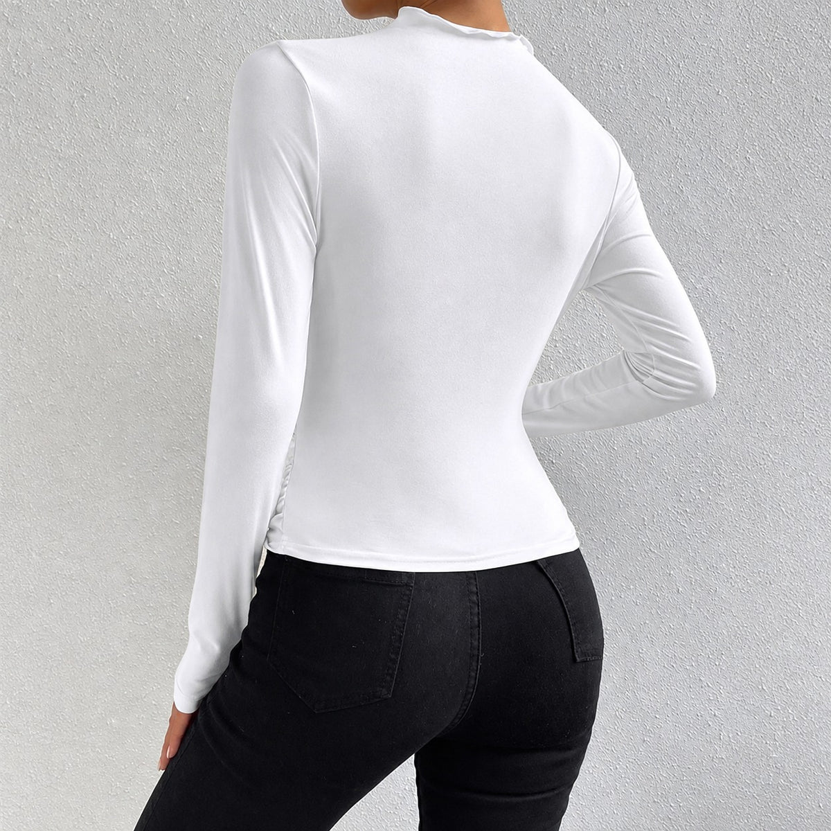 Livia - Langärmliges, figurbetontes Shirt mit Rüschen