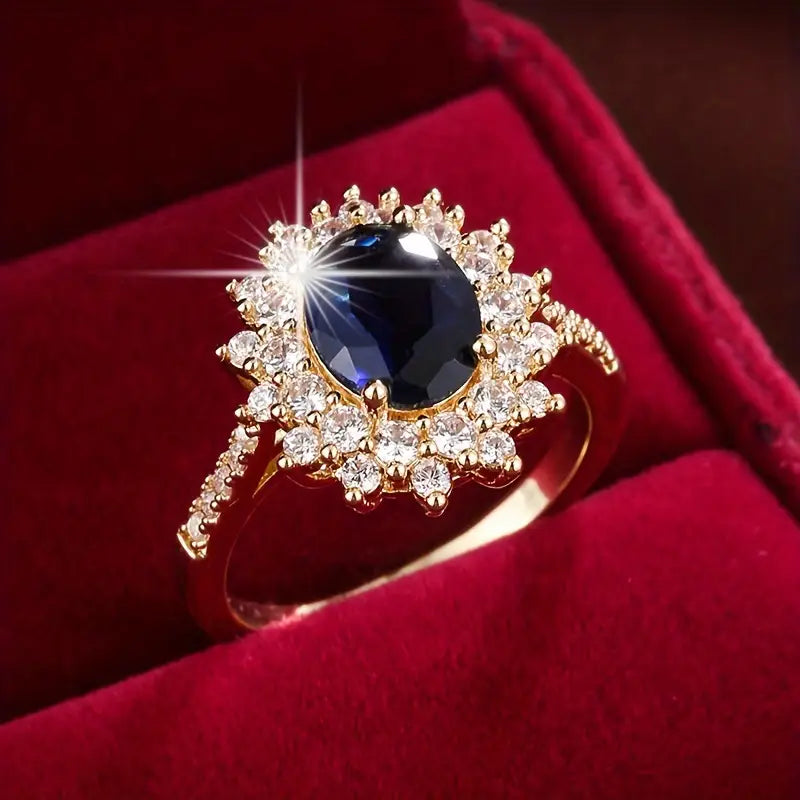 Delphine – Stilvoller goldener Ring mit blauem Stein