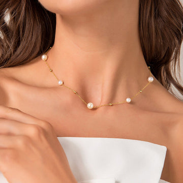Kette aus Gold und Perlen - abwechselnd Perlen und Goldglieder