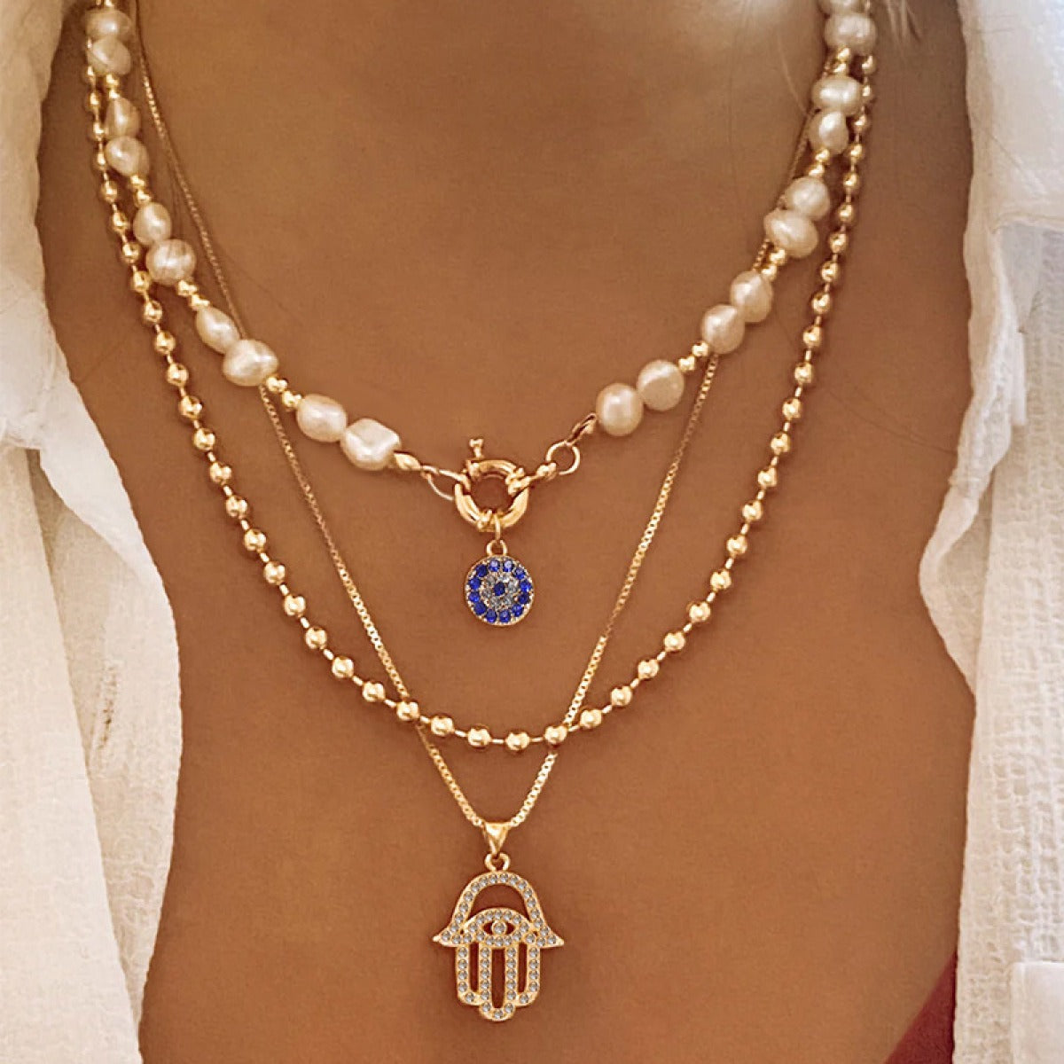 Jade – Mehrschichtige Perlenkette mit Hamsa