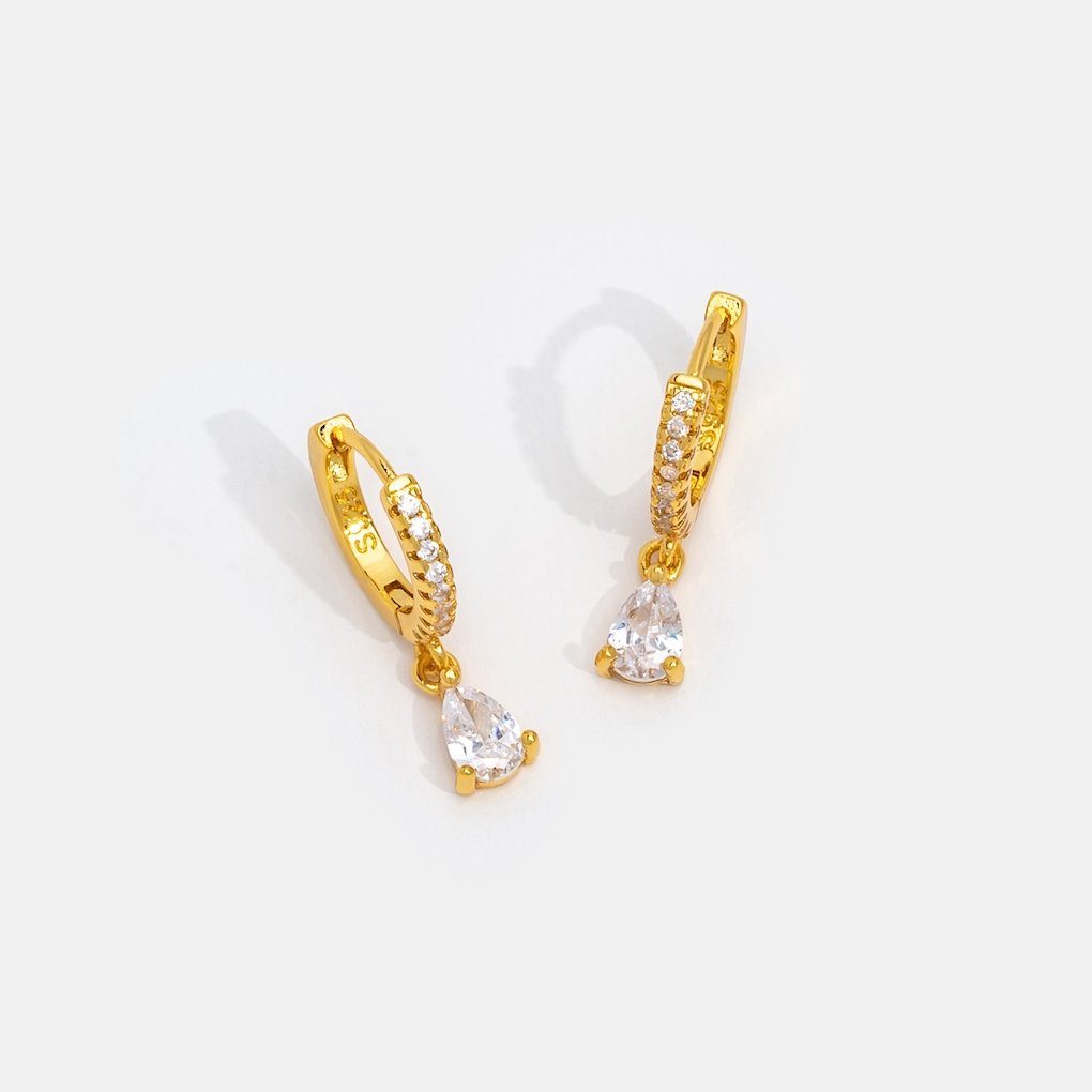 Goldene Ohrringe mit CZ aus weißem Elfenbein